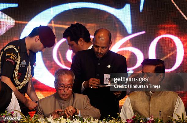 President Pranab Mukherjee and Maharashtra CM Prithviraj Chavan at the diamond jubilee celebrations of Kishinchand Chellaram college at Churchgate,...