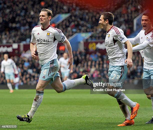 Kevin Nolan of West Ham United celebrates after he scores the second goal of the game for his side during the Barclays Premier League match between...