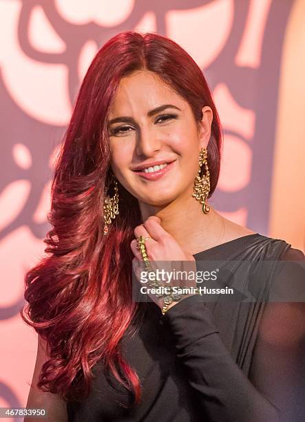 Katrina Kaif attends a photocall to unveil her new wax figure at Madame Tussauds on March 27, 2015 in London, England.
