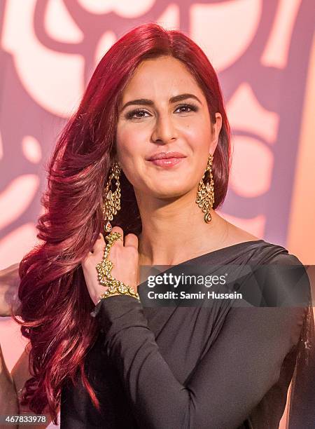 Katrina Kaif attends a photocall to unveil her new wax figure at Madame Tussauds on March 27, 2015 in London, England.