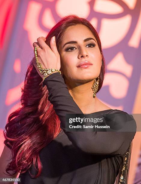 Katrina Kaif attends a photocall to unveil her new wax figure at Madame Tussauds on March 27, 2015 in London, England.