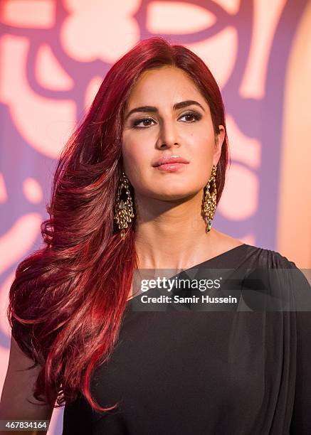 Katrina Kaif attends a photocall to unveil her new wax figure at Madame Tussauds on March 27, 2015 in London, England.