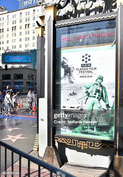 View of a TCM Festival poster at the Christopher Plummer Hand and Footprint Ceremony during the 2015 TCM Classic Film Festival on March 27, 2015 in...