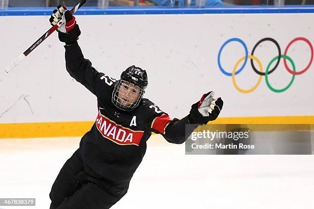 Hayley Wickenheiser of Canada celebrates after scoring a goal against Florence Schelling of Switzerland in the second period during the Women's Ice...