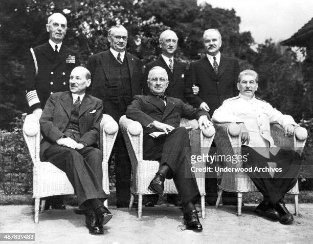 The scene in the palace garden at Potsdam as the Big Three posed for photographers just before the final peace conference meeting, Potsdam, Germany,...