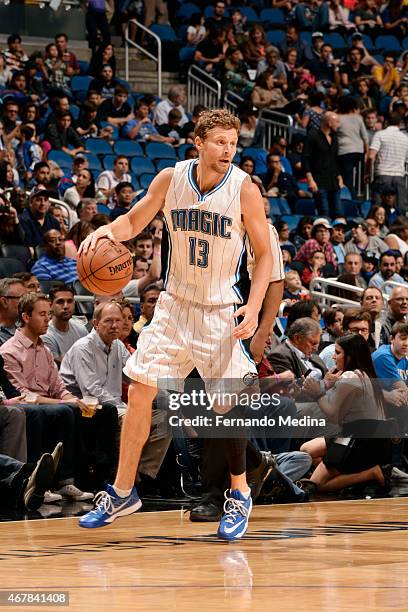 Luke Ridnour of the Orlando Magic handles the ball against the Detroit Pistons on March 27, 2015 at Amway Center in Orlando, Florida. NOTE TO USER:...