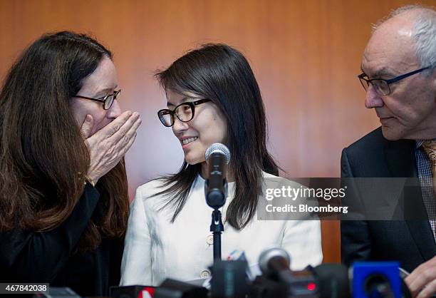 Ellen Pao, former junior partner at Kleiner Perkins Caufield & Byers, center, speaks with her lawyers Therese Lawless, left, and Allan Axelrod while...