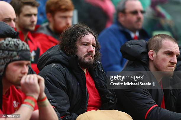 Scott Williams , Adam Jones and Gethin Jenkins of Wales look on from the bench after being substituted during their sides 3-26 defeat during the RBS...
