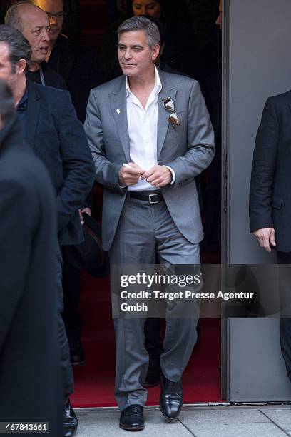 George Clooney leaves the Berlinale Press Centre at Potsdamer Platz on February 8, 2014 in Berlin, Germany.