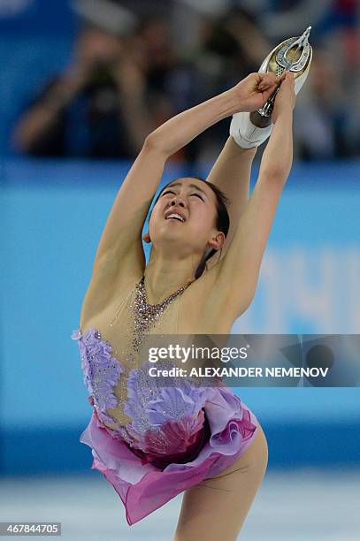 Japan's Mao Asada performs in the Women's Figure Skating Team Short Program at the Iceberg Skating Palace during the 2014 Sochi Winter Olympics on...