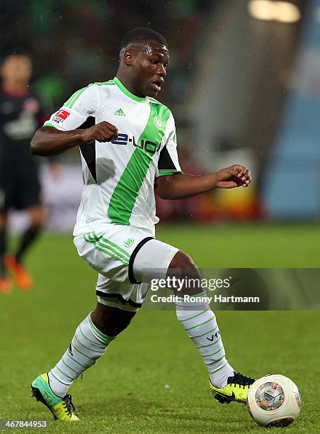 Junior Malanda of Wolfsburg runs with the ball during the Bundesliga match between VfL Wolfsburg and 1. FSV Mainz 05 at Volkswagen Arena on February...