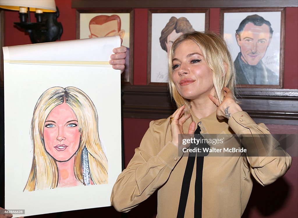Sienna Miller joins the wall of fame as she attends the unveiling of