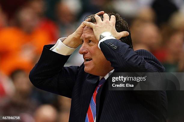 Head coach Mark Gottfried of the North Carolina State Wolfpack reacts against the Louisville Cardinals in the second half of the game during the East...