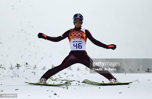Maciej Kot of Poland lands after a jump during the Men's Normal Hill Individual Qualification on day 1 of the Sochi 2014 Winter Olympics at the...