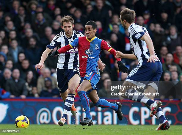 Thomas Ince of Palace vies with Craig Dawson of West Brom defence during the Barclays Premier League match between Crystal Palace and West Bromwich...