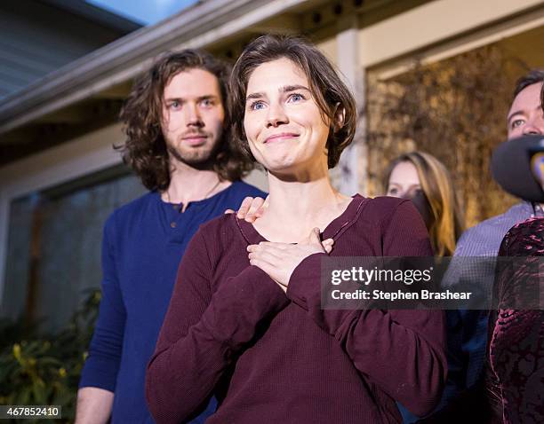 Amanda Knox speaks to the media during a brief press conference in front of her parents' home March 27, 2015 in Seattle, Washington. Knox and...