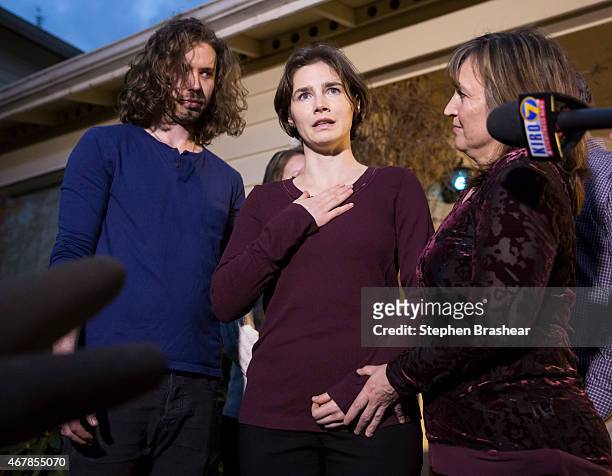 Amanda Knox speaks to the media during a brief press conference in front of her parents' home March 27, 2015 in Seattle, Washington. Knox and...