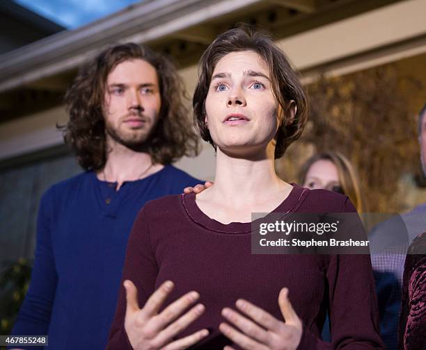 Amanda Knox speaks to the media during a brief press conference in front of her parents' home March 27, 2015 in Seattle, Washington. Knox and...