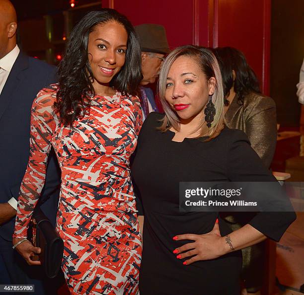 Sarah Elizabeth Reed and Tameka 'Tiny' Harris attend 925 Scales ribbon cutting ceremony at 925 Scales on March 27, 2015 in Atlanta, Georgia.