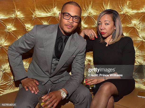 Cliffors 'T.I.' Harris and Tameka 'Tiny' Harris attend 925 Scales Ribbon Cutting Ceremony at 925 Scales on March 27, 2015 in Atlanta, Georgia.