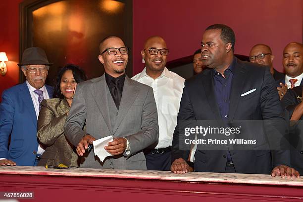 Clifford 'T.I.' Harris and Kasim Reed attend 925 Scales ribbon cutting Ceremony at 925 Scales on March 27, 2015 in Atlanta, Georgia.