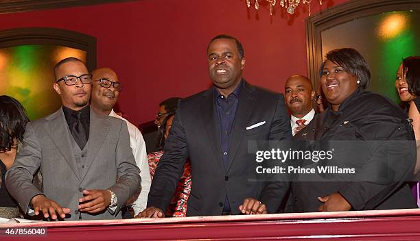 Clifford 'T.I.' Harris and Kasim Reed attend 925 Scales ribbon cutting Ceremony at 925 Scales on March 27, 2015 in Atlanta, Georgia.