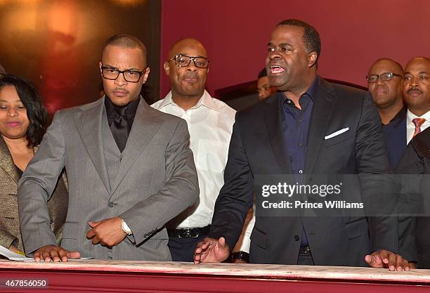 Clifford 'T.I.' Harris and Kasim Reed attend 925 Scales ribbon cutting Ceremony at 925 Scales on March 27, 2015 in Atlanta, Georgia.