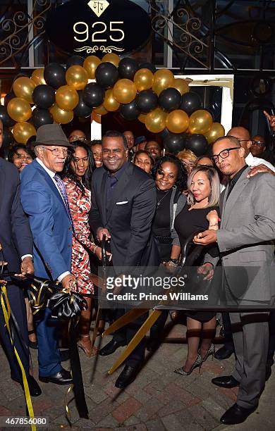 Kwanza Hall, Kasim Reed, Tameka 'Tiny' Harris, and Clifford 'T.I. Harris attend 925 Scales ribbon cutting at 925 Scales on March 27, 2015 in Atlanta,...