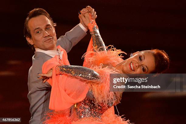 Ralf Bauer and Oana Nechiti perform on stage during the 3rd show of the television competition 'Let's Dance' on March 27, 2015 in Cologne, Germany.
