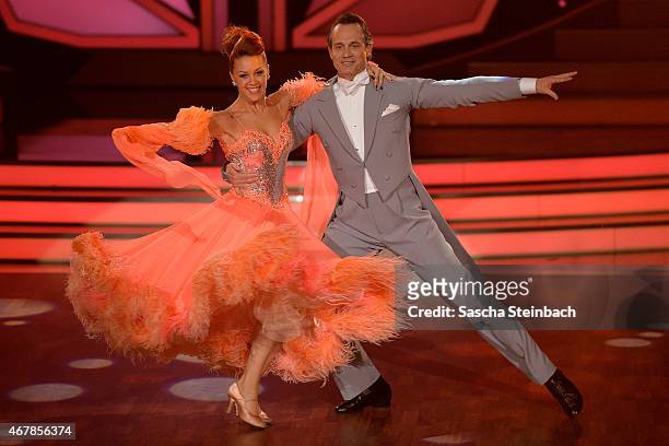 Ralf Bauer and Oana Nechiti perform on stage during the 3rd show of the television competition 'Let's Dance' on March 27, 2015 in Cologne, Germany.