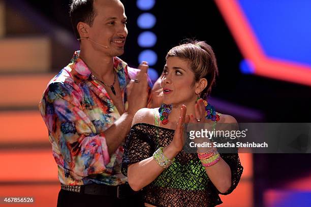 Panagiota Petridou and Sergiu Luca react during the 3rd show of the television competition 'Let's Dance' on March 27, 2015 in Cologne, Germany.
