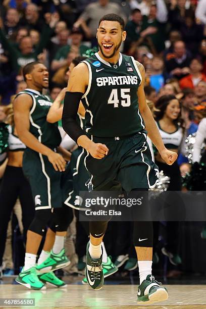 Denzel Valentine of the Michigan State Spartans reacts after a basket in the second half of the game against the Oklahoma Sooners during the East...