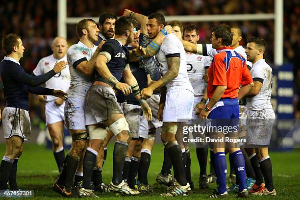 Ryan Wilson of Scotland and Courtney Lawes of England clash during the RBS Six Nations match between Scotland and England at Murrayfield Stadium on...