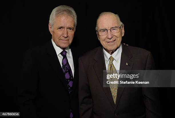 Personality Alex Trebek and astronaut Jim Lovell attend the screening of 'Apollo 13' during day two of the 2015 TCM Classic Film Festival on March...