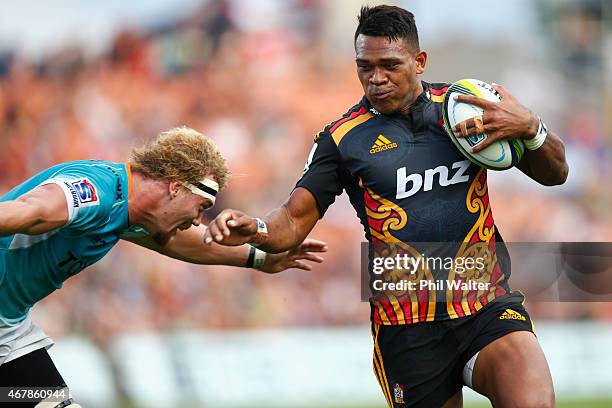 Seta Tamanivalu of the Chiefs is tackled during the round seven Super Rugby match between the Chiefs and the Cheetahs at Waikato Stadium on March 28,...