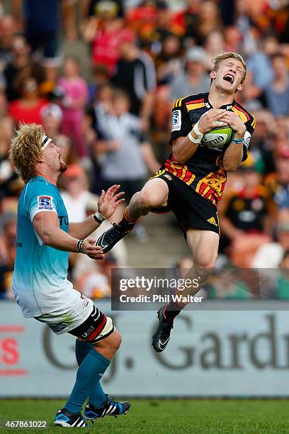 Damian McKenzie of the Chiefs collects the high ball during the round seven Super Rugby match between the Chiefs and the Cheetahs at Waikato Stadium...