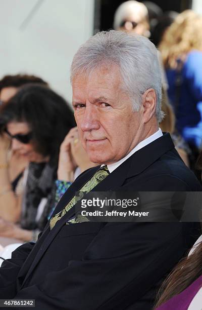 Personality Alex Trebek attends the Christopher Plummer Hand and Footprint Ceremony during the 2015 TCM Classic Film Festival on March 27, 2015 in...