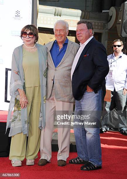 Actress Shirley MacLaine, honoree Christopher Plummer and actor William Shatner attend the Christopher Plummer Hand and Footprint Ceremony during the...
