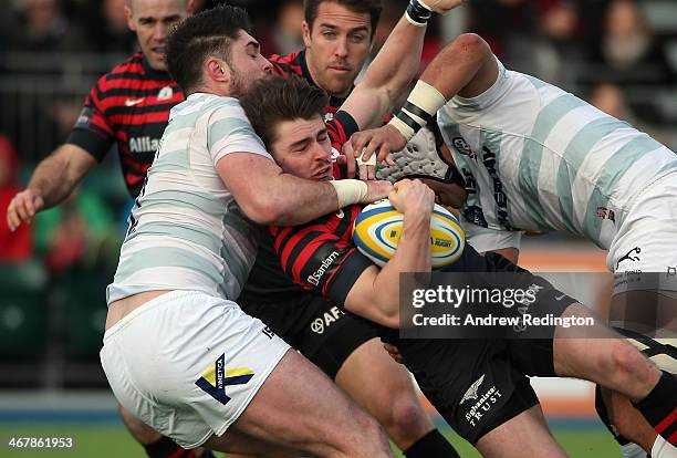 Ben Ransom of Saracens takes on the London Irish defence during the Aviva Premiership match between Saracens and London Irish at Allianz Park on...
