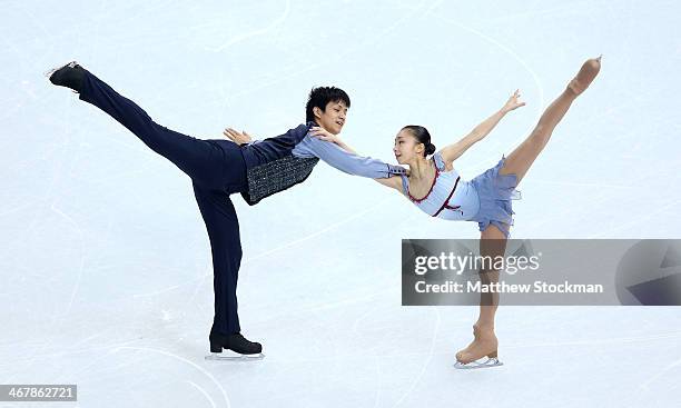 Narumi Takahashi and Kihara Ryuichi of Japan compete in the Figure Skating Team Pairs Free Skating during day one of the Sochi 2014 Winter Olympics...