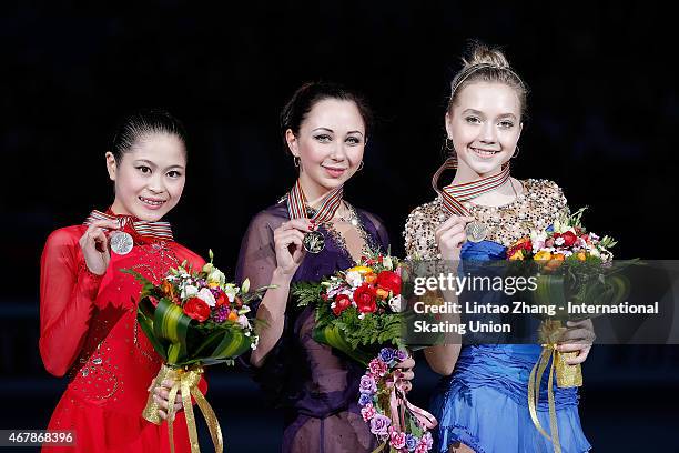 Second place winner Satoko Miyahara of Japan, First place winner Elizaveta Tuktamysheva of Russia and Third place winner Elena Radionova of Russia...