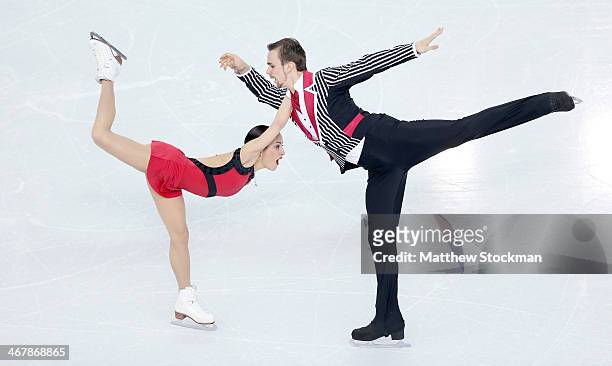 Ksenia Stolbova and Fedor Klimov of Russia compete in the Figure Skating Team Pairs Free Skating during day one of the Sochi 2014 Winter Olympics at...