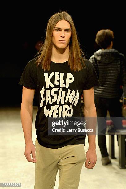 Model prepares backstage at the Son Jung Wan fashion show during Mercedes-Benz Fashion Week Fall 2014 at The Pavilion at Lincoln Center on February...