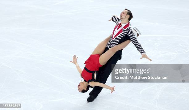 Ksenia Stolbova and Fedor Klimov of Russia compete in the Figure Skating Team Pairs Free Skating during day one of the Sochi 2014 Winter Olympics at...