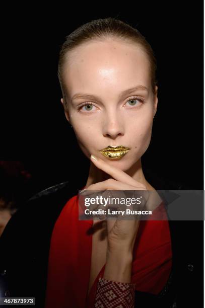Model poses backstage at the Son Jung Wan fashion show during Mercedes-Benz Fashion Week Fall 2014 at The Pavilion at Lincoln Center on February 8,...