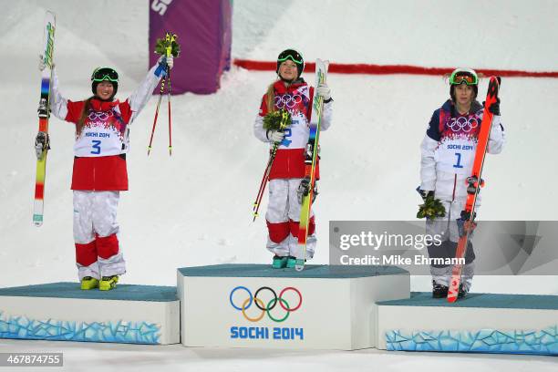 Silver medalist Chloe Dufour-Lapointe of Canada, gold medalist Justine Dufour-Lapointe of Canada and bronze medalist Hannah Kearney of the United...