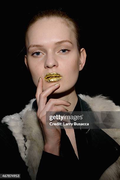 Model poses backstage at the Son Jung Wan fashion show during Mercedes-Benz Fashion Week Fall 2014 at The Pavilion at Lincoln Center on February 8,...