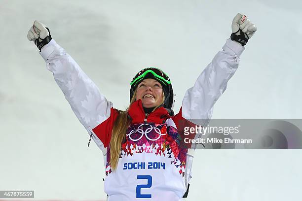 Gold medalist Justine Dufour-Lapointe of Canada celebrates on the podium during the flower ceremony following the Ladies' Moguls Final 3 on day one...