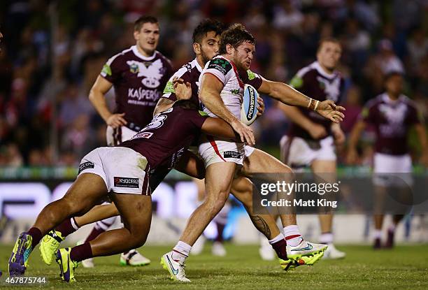 Mitch Rein of the Dragons is tackled during the round four NRL match between the St George Illawarra Dragons and the Manly Warringah Sea Eagles at...