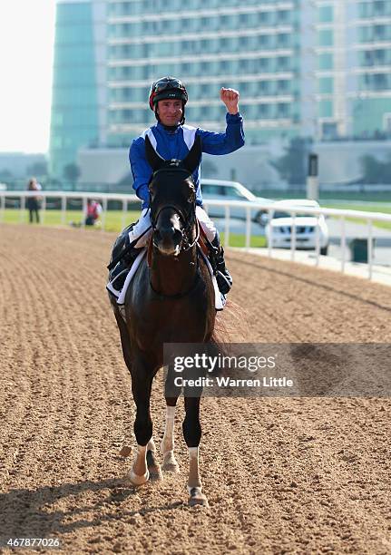 Manark ridden by Dane O'Neill wins the Dubai Kahayla Classic during the Dubai World Cup at the Meydan Racecourse on March 28, 2015 in Dubai, United...